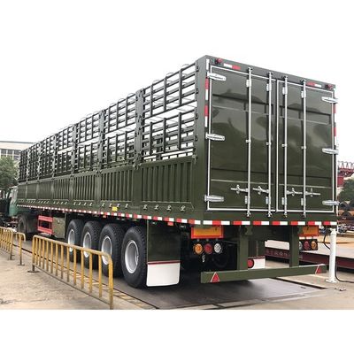 Semi-remolque de camión de 60 toneladas de capacidad de carga con cerca y lona de vigas principales T700/Q345 de acero